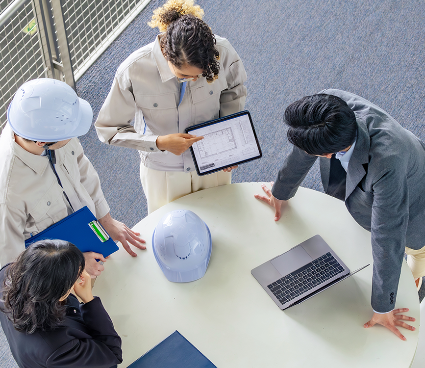 Group of multinational engineers and business people meeting
