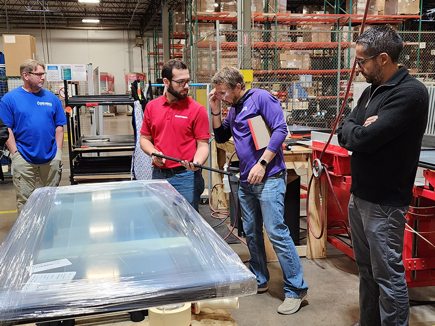 manufacturers-reviewing-product-wide manufacturers reviewing product