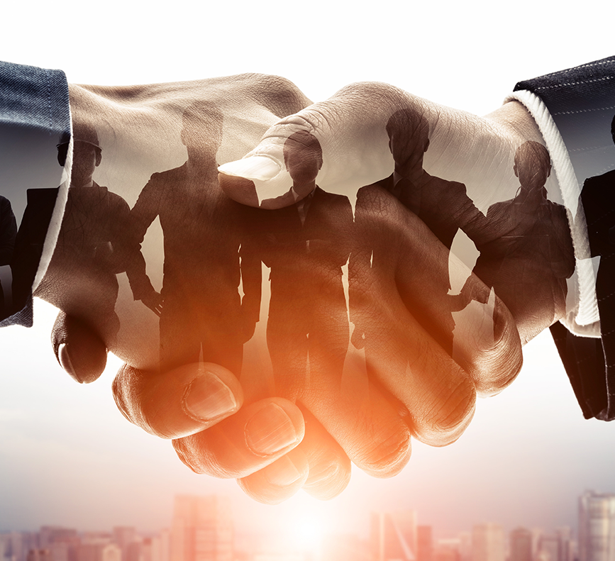 two people shaking hands with people overlaid and a city in the background